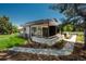 Beautiful exterior of the home with stone accents, manicured landscaping, and inviting walkways at 17326 W 57Th Ave, Golden, CO 80403