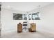 Bright home office with three large windows providing ample natural light and views at 17326 W 57Th Ave, Golden, CO 80403
