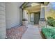 Charming front porch with stone accents, a cozy welcome mat, and manicured landscaping at 13033 Grant E Cir # B, Thornton, CO 80241