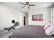 Bright bedroom with a king-size bed and access to a walk-in closet at 24257 E 41St Ave, Aurora, CO 80019