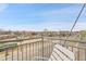 City views from a cozy balcony with a chair at 2900 N Downing St # 311, Denver, CO 80205