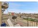 Enjoy a cityscape view from this open-air balcony with seating and a great perspective at 2900 N Downing St # 311, Denver, CO 80205