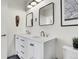 Bright bathroom features a double sink vanity with marble countertop and modern fixtures at 2900 N Downing St # 311, Denver, CO 80205