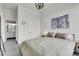 Cozy bedroom featuring a calming color palette and access to an ensuite bathroom at 2900 N Downing St # 311, Denver, CO 80205
