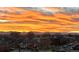 Panoramic sunset view featuring orange skies and mountains at 2900 N Downing St # 311, Denver, CO 80205