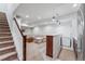 Finished basement with a cozy seating area, neutral colors, and recessed lighting at 1082 Roslyn St, Denver, CO 80230