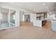 Spacious open-concept living area with hardwood floors, perfect for entertaining and relaxing at 1783 Morgan Dr, Erie, CO 80516