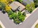 Aerial view of home showing lush greenery, nearby streets, and well-maintained landscaping at 6008 S Van Gordon St, Littleton, CO 80127