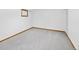 Finished basement with neutral carpet and a window providing natural light at 6008 S Van Gordon St, Littleton, CO 80127