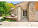 Inviting front entrance with stone accents, seating area, and a well-maintained walkway at 6008 S Van Gordon St, Littleton, CO 80127