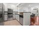 Cozy kitchen with stainless steel appliances and tile backsplash and granite countertops at 2855 Rock Creek Cir # 191, Superior, CO 80027