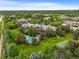 Expansive estate featuring a large pool, basketball court, mature trees, and beautifully landscaped grounds at 4030 E Forbes Ct, Greenwood Village, CO 80121