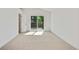 Bright, airy bedroom features vaulted ceilings and access to private balcony at 9605 Carr St, Broomfield, CO 80021