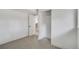 Bedroom view with open closet and doorway leading to a staircase at 9605 Carr St, Broomfield, CO 80021