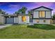 Charming two-story home with a well-maintained lawn, painted in white and gray at 9605 Carr St, Broomfield, CO 80021