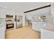 Updated kitchen with stainless steel appliances and breakfast bar seating at 9605 Carr St, Broomfield, CO 80021