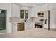 Updated kitchen with stainless steel appliances and bright subway tile at 9605 Carr St, Broomfield, CO 80021