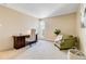 Bright bedroom featuring a desk, a chair and an additional sitting area by the window at 955 Eudora St # 708E, Denver, CO 80220