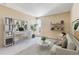 Well-lit home office setup with a comfortable desk, shelving, a cozy seating area, and stylish decor at 955 Eudora St # 708E, Denver, CO 80220