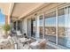 Relaxing patio with outdoor seating overlooking the city skyline at 955 Eudora St # 708E, Denver, CO 80220