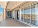 Spacious patio with sliding glass doors offering city views at 955 Eudora St # 708E, Denver, CO 80220