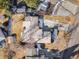 An aerial view of the property and surrounding neighborhood highlighting mature trees at 4470 W Lakeridge Rd, Denver, CO 80219