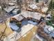 An aerial view of a brown single Gathering home with a long driveway at 4470 W Lakeridge Rd, Denver, CO 80219