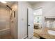 Recently remodeled bathroom with a tile shower, new vanity, and modern fixtures at 4470 W Lakeridge Rd, Denver, CO 80219