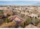 Aerial view of community featuring mature trees and basketball court at 540 S Forest St # 6-203, Denver, CO 80246