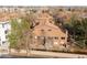 Aerial view of townhome community with mature trees and manicured landscaping at 540 S Forest St # 6-203, Denver, CO 80246