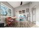 Bright dining area featuring a modern table set, spice rack, and stainless steel refrigerator at 540 S Forest St # 6-203, Denver, CO 80246