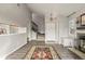 Spacious entryway with stairs, a front door, storage, and a fireplace at 540 S Forest St # 6-203, Denver, CO 80246