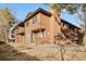 Two-story exterior showcasing the building's architecture, landscaping, and outdoor spaces at 540 S Forest St # 6-203, Denver, CO 80246