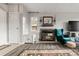Comfortable Living Room featuring a cozy fireplace and ample natural light at 540 S Forest St # 6-203, Denver, CO 80246