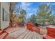 Red-painted wooden deck featuring railings and outdoor seating at 21541 Unbridled Ave, Parker, CO 80138