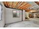 Unfinished basement featuring exposed ceiling and concrete walls, offering potential for customization at 21541 Unbridled Ave, Parker, CO 80138