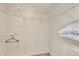 Walk-in closet featuring white wire shelving and ample storage space at 21541 Unbridled Ave, Parker, CO 80138