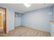 Spare bedroom with closet and light blue walls at 10687 W 107Th Ave, Broomfield, CO 80021