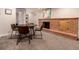 Charming dining area with a brick fireplace and comfortable seating at 6572 E Dakota Ave, Denver, CO 80224