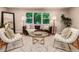 Bright living room with large windows, designer furniture, and stylish decor at 6572 E Dakota Ave, Denver, CO 80224