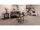 Inviting living room area features a comfortable sofa, decor, and built-in shelving at 6572 E Dakota Ave, Denver, CO 80224