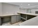 Basement bar area featuring light countertops, cabinets, a sink, and recessed lighting at 1596 S Stuart St, Denver, CO 80219
