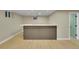 Basement wet bar with a light countertop, cabinets, sink, and modern finishes at 1596 S Stuart St, Denver, CO 80219