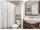 Bathroom featuring updated fixtures, vanity, and shower-tub combination at 4569 S Lowell Blvd # C, Denver, CO 80236