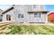 Exterior view of a home showcasing siding, windows, and backyard at 2314 Flagstaff Dr, Longmont, CO 80504