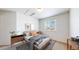 Bedroom featuring modern decor and a window providing natural light at 2314 Flagstaff Dr, Longmont, CO 80504