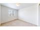 Bedroom featuring a window and neutral finishes at 2314 Flagstaff Dr, Longmont, CO 80504