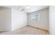 Bedroom featuring a window and neutral finishes at 2314 Flagstaff Dr, Longmont, CO 80504