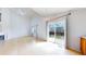 Bright living area with fireplace, sliding glass doors and natural light at 2314 Flagstaff Dr, Longmont, CO 80504