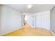 Spacious living room with wood floors and white trim at 2314 Flagstaff Dr, Longmont, CO 80504